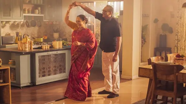 Couple dancing at home