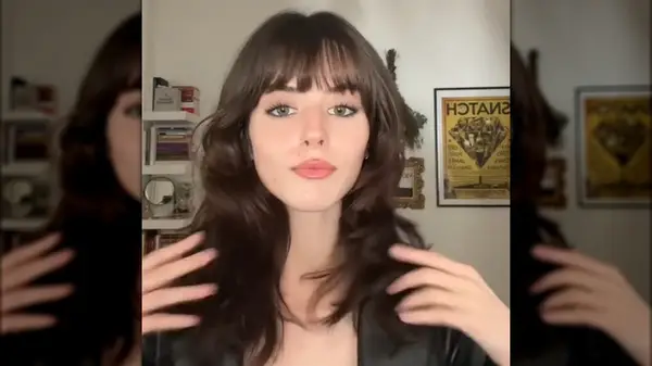 Woman with soft wolf cut hair