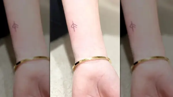 Wrist micro tattoo