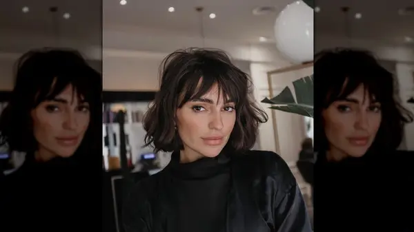 Brunette woman with a French bob haircut