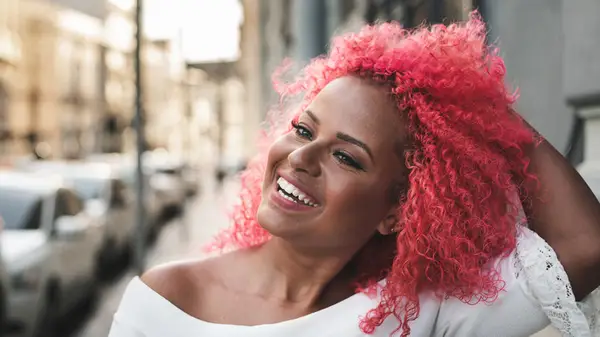 Woman with brightly colored hair