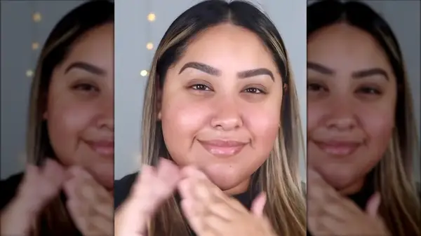 Woman applying primer