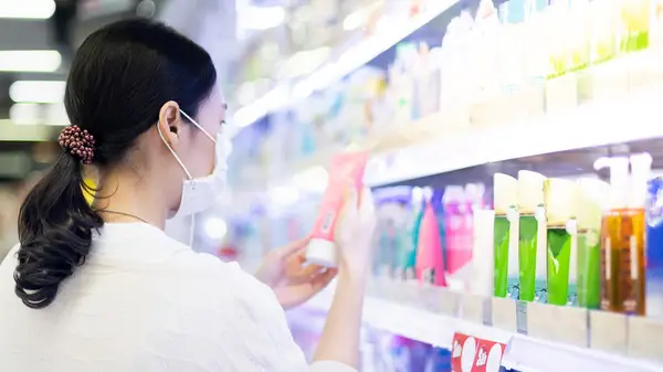 Woman buying hair product