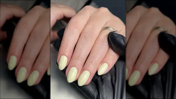 Freshly painted butter yellow manicure