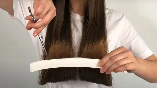 A woman using a CreaClip