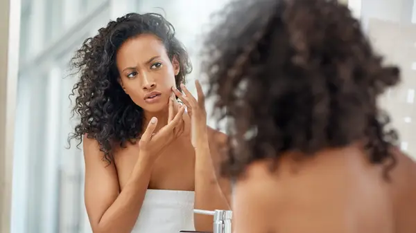 Person looking in a mirror