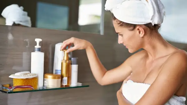 Woman looking at beauty products