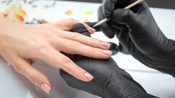 Getting manicure done