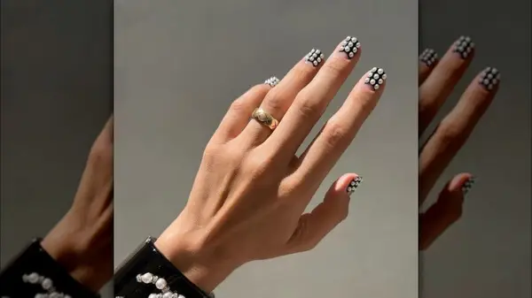 Pearls on black nails