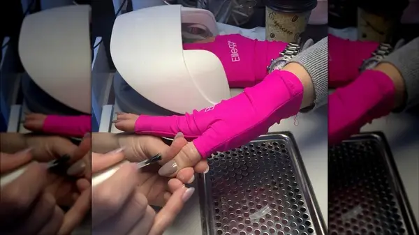 Person wearing UV gloves