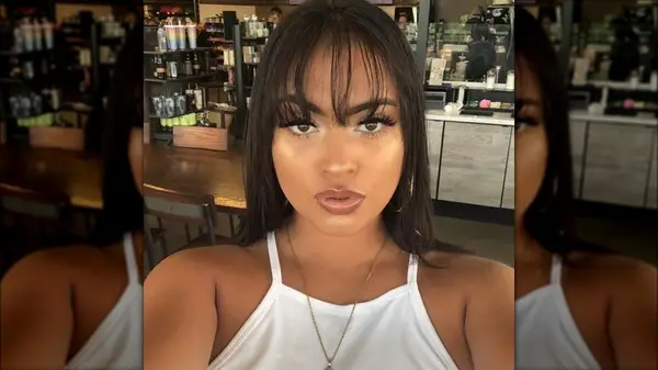 Woman with long bangs