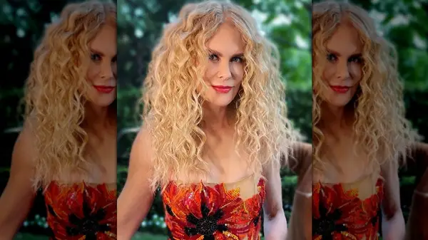 Nicole Kidman poses for a photo with curly hair