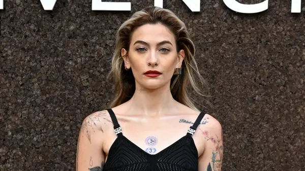 Paris Jackson wearing a black dress 2022