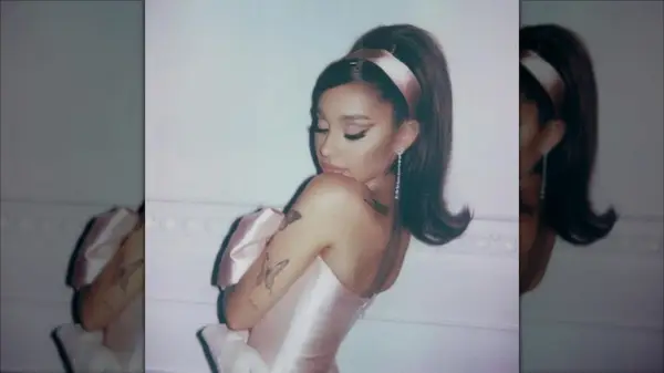 Ariana Grande poses for 