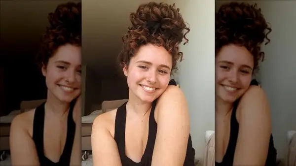 Woman with red hair smiling