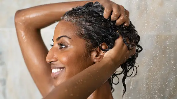 Woman washing her hair