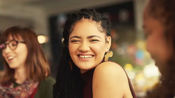 Woman smiling with gap tooth