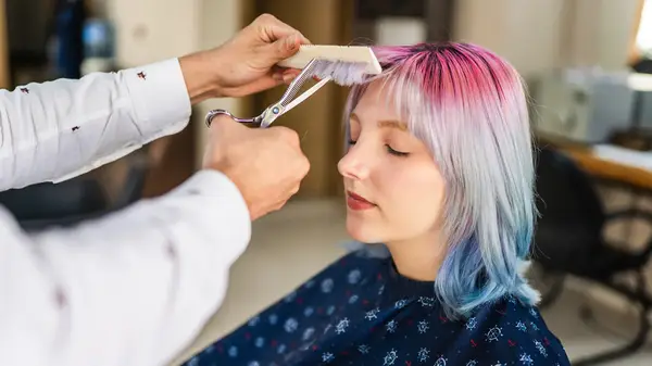 Woman having a haircut