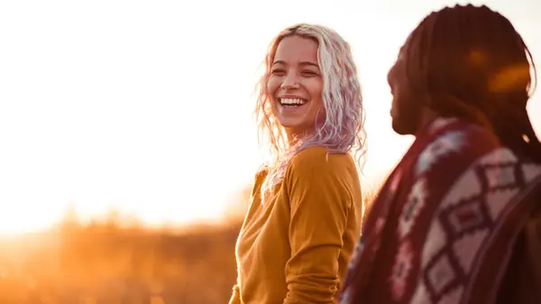 blond and brunette women