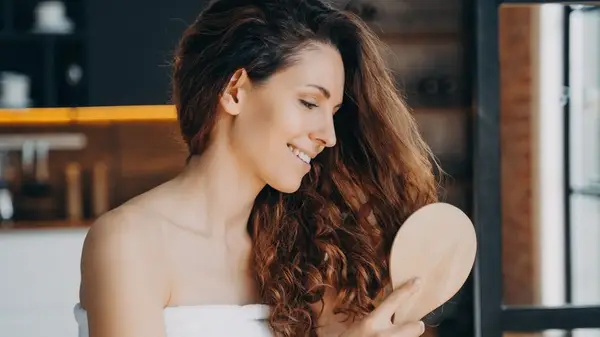 Woman brushing her hair