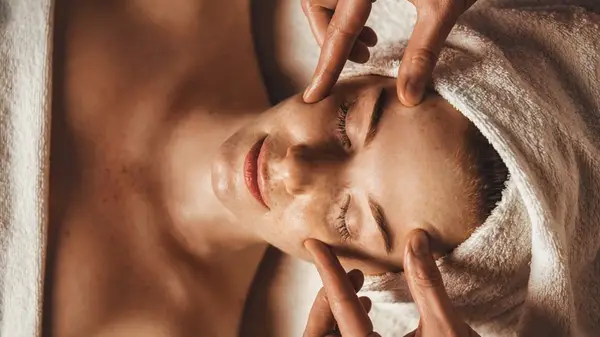 Woman getting facial