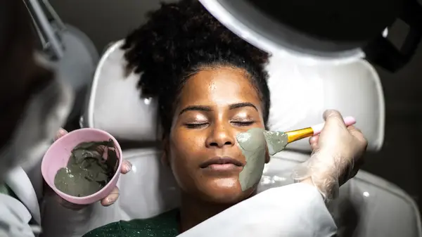 Woman getting facial