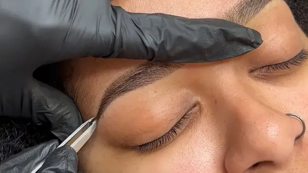 Woman getting powder brows