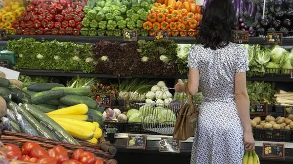 A woman shops for food
