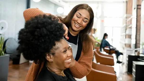 Two women in a salon