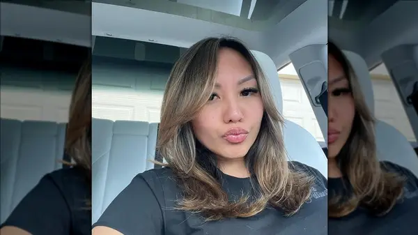 Woman with long bangs