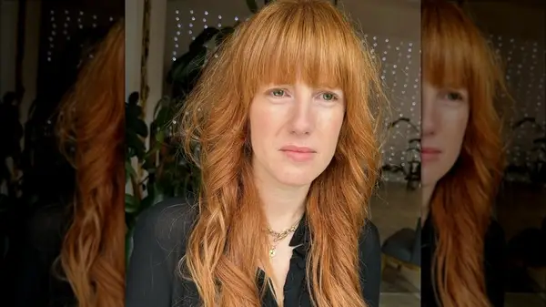 Woman with blunt bangs