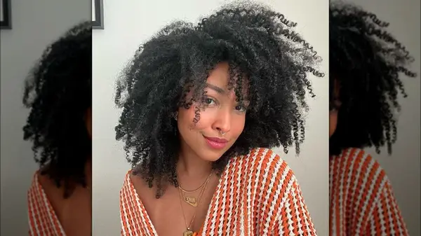 Woman showing natural texture hair