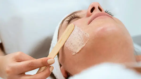 Woman getting professional exfoliation