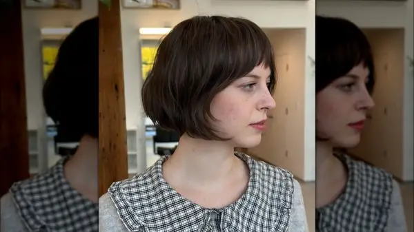 Woman poses for photo