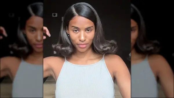 Woman with bell-bottom bob