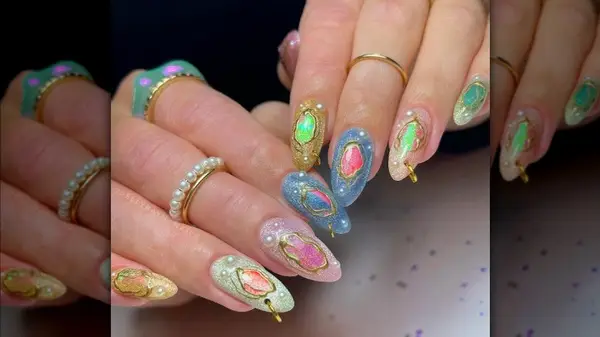 manicure with pearls and pierced hoops