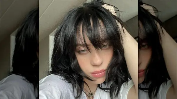 Billie Eilish with long bangs