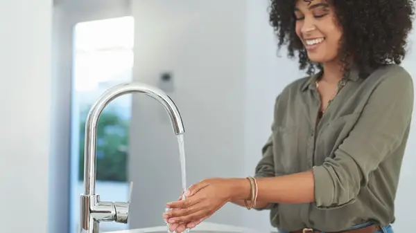 Person washing their hands