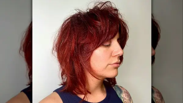 Person with red cub cut