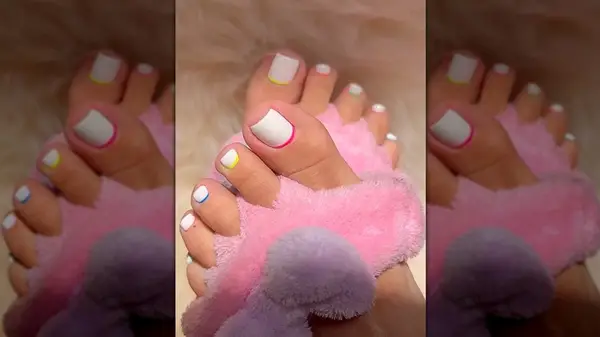 white pedicure with neon reverse french