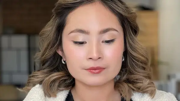 Woman with glass skin makeup