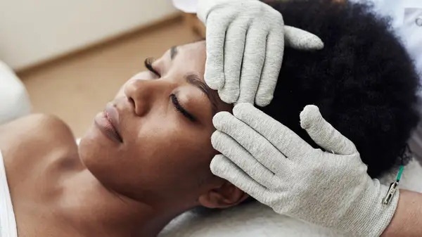 Woman getting a lymphatic drainage massage