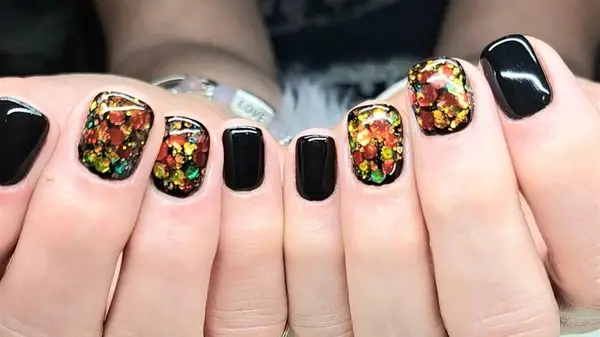Black and glitter nail art