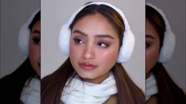 Woman wearing ear muffs