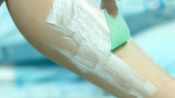 Scraping hair removal cream