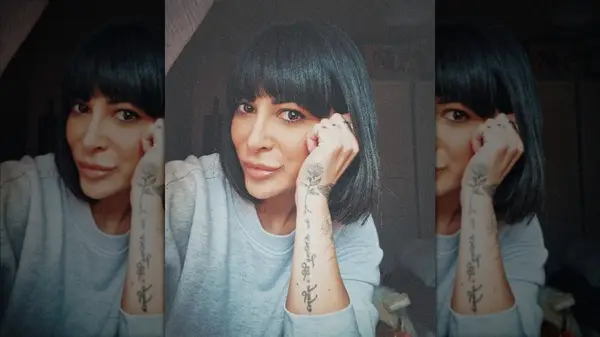 Woman with a bob and bangs