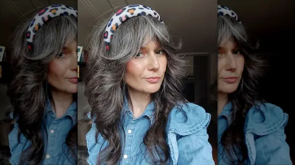 Woman with curtain bangs