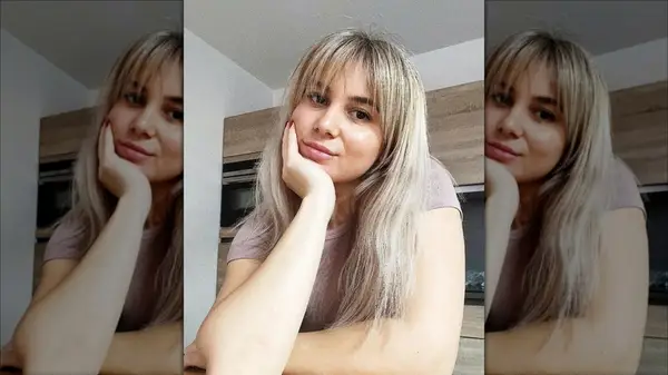 Woman with eyelash bangs