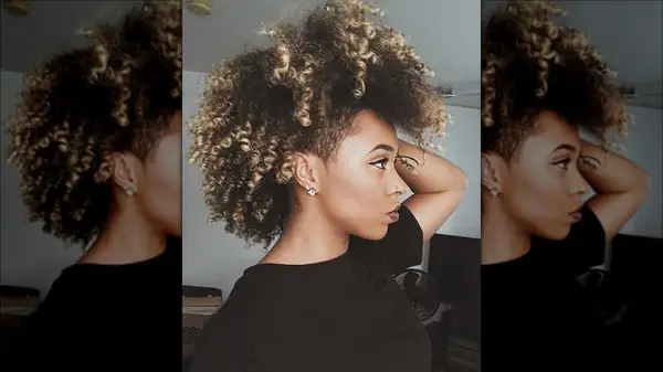 Woman with a curly mohawk