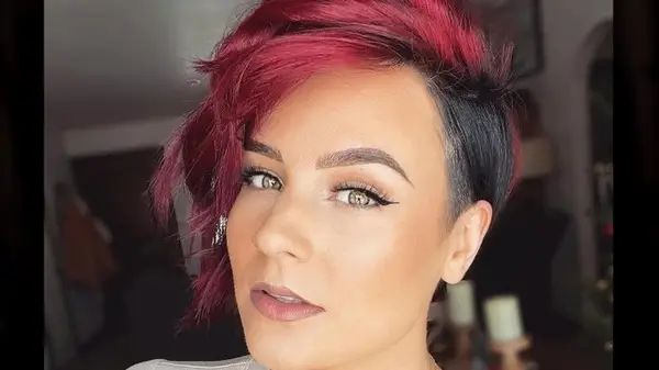 Person with short, red haircut